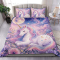 Pastel unicorn duvet cover set displayed on a bed with floral, moon, star, and galaxy artwork