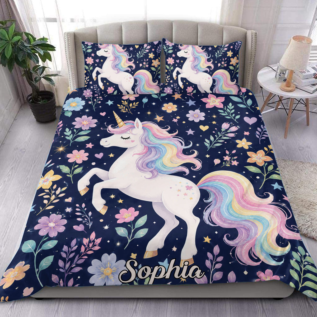 Unicorn duvet cover set on a bed with pastel rainbow manes, flowers, stars, and a navy background