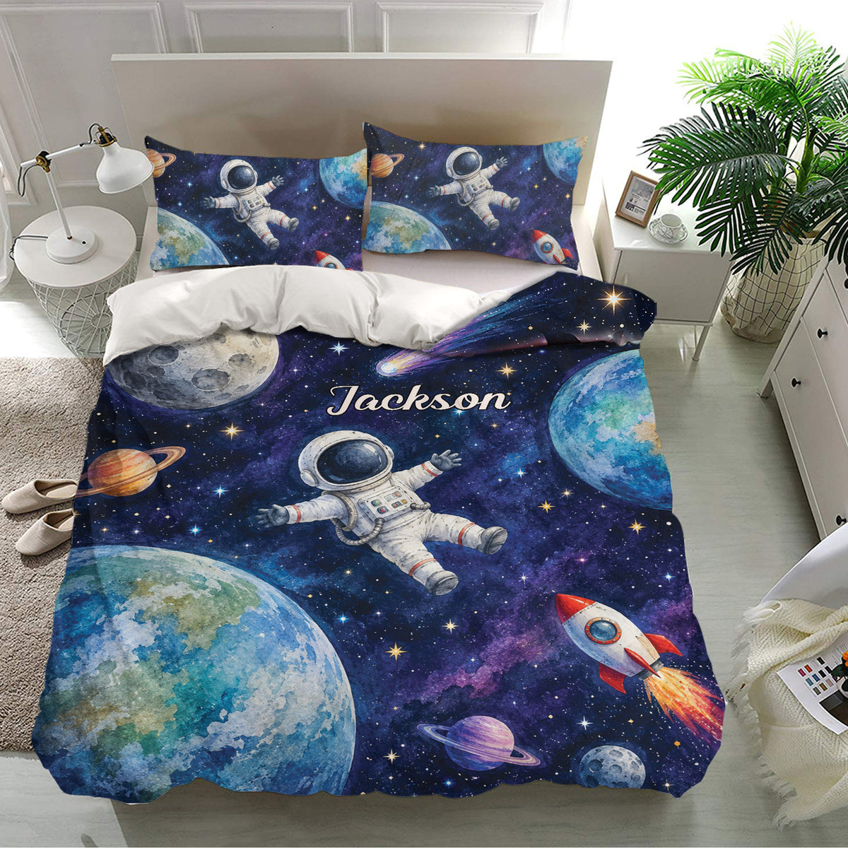 Space-themed astronaut bedding set displayed in a bright bedroom with matching pillowcases and colorful planet artwork