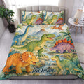 Dinosaur duvet cover bedding set displayed on a bed with colorful prehistoric artwork and jungle scenery
