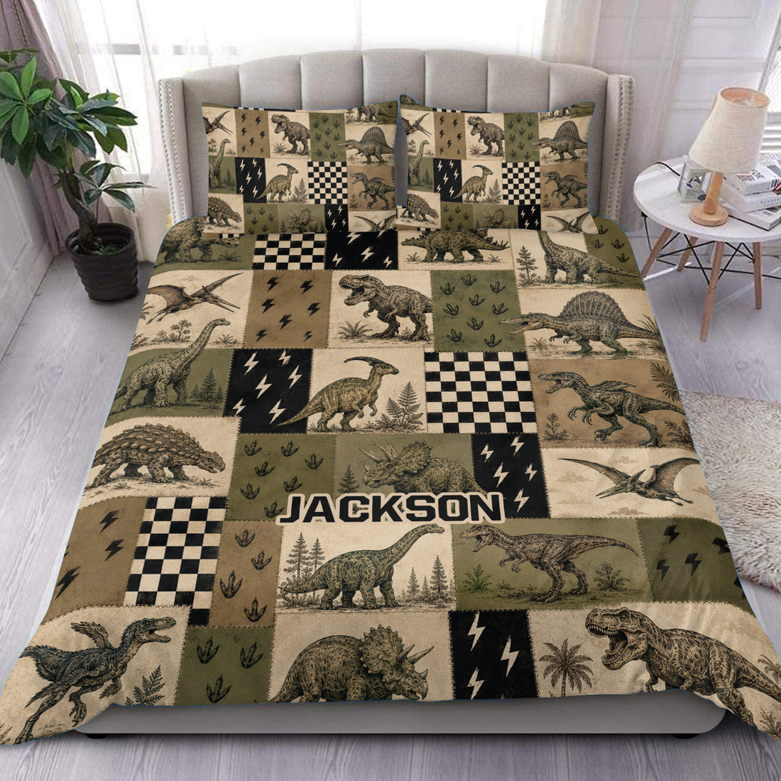 Dinosaur duvet cover bedding set displayed on a bed with vintage patchwork artwork in olive, tan, cream, and black