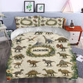 Dinosaur duvet cover bedding set styled in a bedroom with realistic dinosaur illustrations and botanical jungle accents