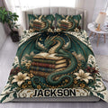 Dragon duvet cover set displayed on a bed with green dragons, vintage books, flowers, and celestial details