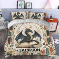 Dragon duvet cover styled in a bedroom with floral branches, stacked books, moon, and rich fantasy details