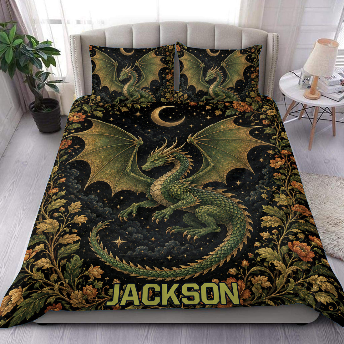 Dragon duvet cover set styled on a bed with green wings, crescent moons, stars, and floral borders