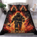 Firefighter duvet cover bedding set displayed on a bed with dramatic flames and bold black, red, and orange artwork