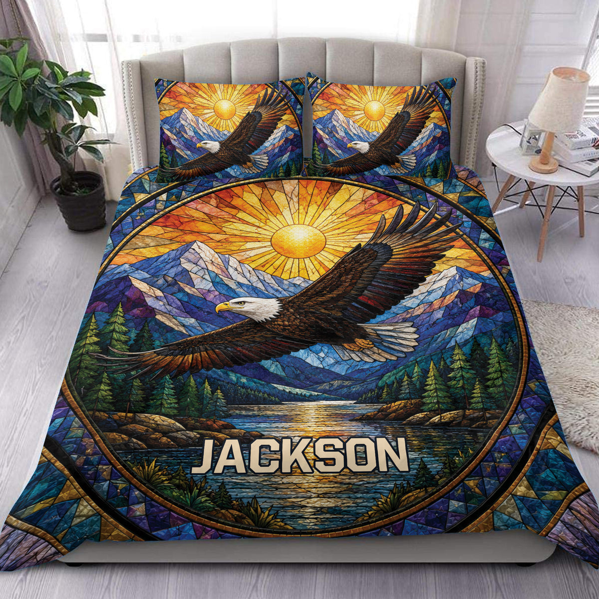 Eagle duvet cover set displayed on a bed with stained glass mountains, sunrise, forest, and river artwork