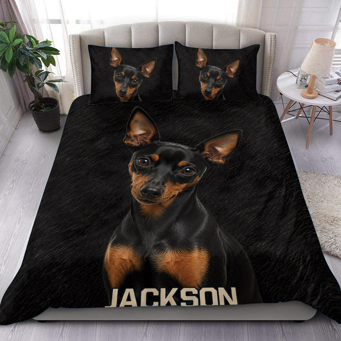 Black and tan Miniature Pinscher duvet cover set styled on a modern bedroom bed