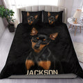 Black and tan Miniature Pinscher duvet cover set styled on a modern bedroom bed