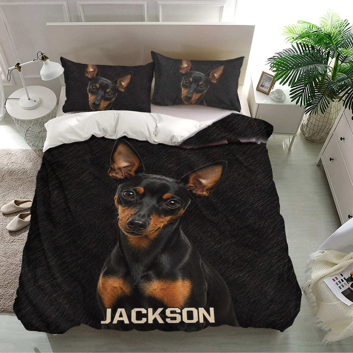 Black Miniature Pinscher duvet cover and matching pillowcases displayed in a bright modern bedroom