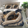Miniature Pinscher bedding set displayed in a bright bedroom with matching pillowcases and celestial wing design