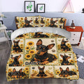 Miniature Pinscher duvet cover styled in a bedroom with sunflower portraits, paw prints, and warm decor