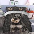 Miniature Schnauzer duvet cover styled in a contemporary bedroom with matching pillowcases and dog artwork