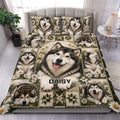 Alaskan Malamute duvet cover set displayed on a bed with multiple dogs, daisies, and rustic green patchwork