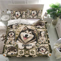 Alaskan Malamute bedding set styled in a bright bedroom with matching pillowcases and floral dog artwork