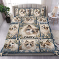 Ragdoll cat duvet cover set displayed on a bed with blue floral panels and matching pillowcases