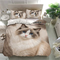 Ragdoll cat bedding set displayed in a bright bedroom with large blue-eyed cat artwork