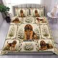 Bloodhound duvet cover set displayed on a bed with daisy panels and warm rustic dog artwork