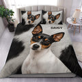 Rat Terrier duvet cover set displayed on a bed with a realistic black, white, and tan dog portrait