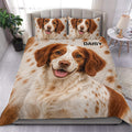 Brittany Spaniel duvet cover set displayed on a bed with matching dog portrait pillowcases and warm brown tones