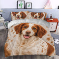 Brittany Spaniel duvet cover set styled in a bedroom with a large realistic dog portrait and matching pillows