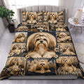 Lhasa Apso duvet cover set displayed on a bed with floral patchwork artwork in navy, tan, and cream
