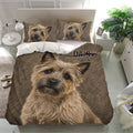 Cairn Terrier duvet cover set shown in a bright bedroom with matching portrait pillowcases