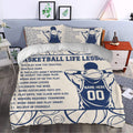Basketball duvet cover bedding set styled in a bedroom with navy player artwork and motivational sports lettering