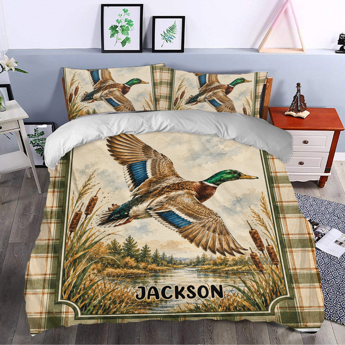 Rustic duck hunting bedding styled in a bedroom with mallard artwork, wetland scenery, and plaid accents