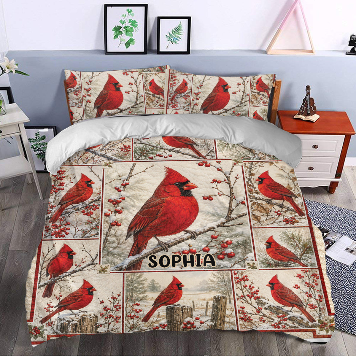 Cardinal duvet cover bedding displayed in a bedroom with red bird artwork and snowy woodland accents
