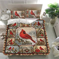 Red cardinal duvet cover bedding set displayed in a bright bedroom with matching pillowcases and winter woodland artwork.