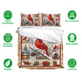Cardinal bedding set shown with matching pillowcases and a snowy holiday bird design in red and green