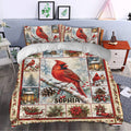 Cardinal duvet cover styled in a bedroom with snowy branches, lanterns, berries, and seasonal greenery
