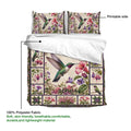 Hummingbird duvet cover set with detailed floral artwork, botanical borders, and matching pillowcases