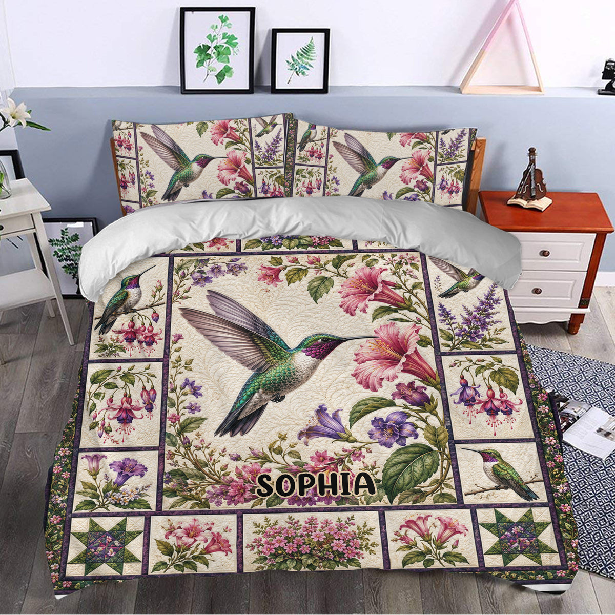 Hummingbird bedding set styled in a bedroom with pink hibiscus, purple flowers, and botanical artwork