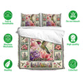 Hummingbird bedding set displayed with matching floral pillowcases in a detailed botanical pattern