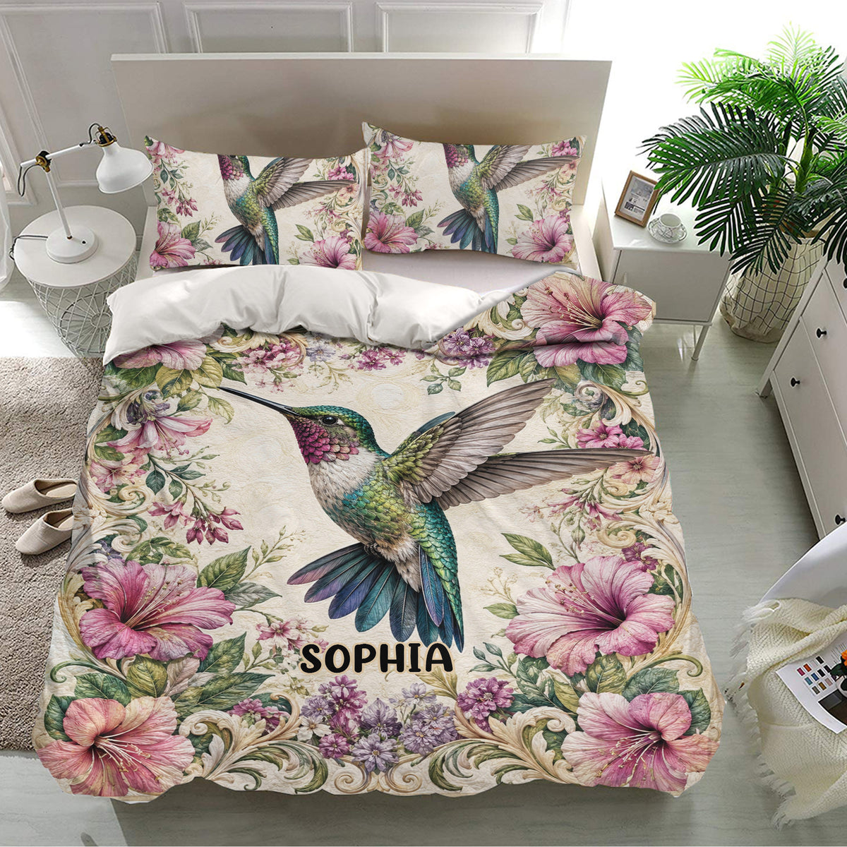 Hummingbird duvet cover set in a bright bedroom with matching floral pillowcases and tropical botanical accents