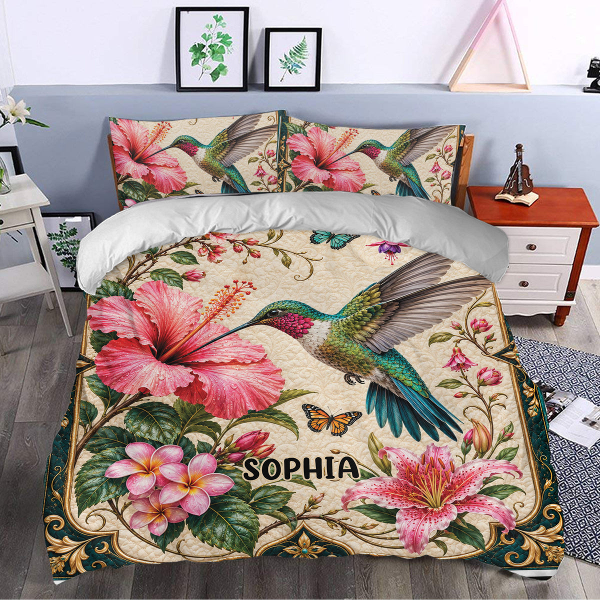Hummingbird duvet cover set styled in a bedroom with tropical flowers, butterflies, and decorative botanical artwork