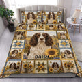 English Springer Spaniel duvet cover set displayed on a bed with sunflowers, butterflies, and pastoral patchwork panels