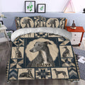 Greyhound duvet cover set styled in a bedroom with navy geometric borders and portrait artwork
