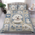 Bichon Frise duvet cover set displayed on a bed with blue floral patchwork artwork and matching pillowcases