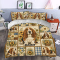 Basset hound duvet cover styled on a bed with sunflowers, patchwork blocks, and farmhouse decor