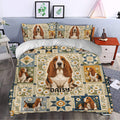 Basset Hound duvet cover set styled in a bedroom with daisy florals, blue accents, and patchwork artwork