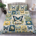 Butterfly duvet cover set with blue and gold butterflies, daisies, and vintage floral patchwork in a bedroom