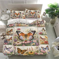 Floral butterfly duvet cover set styled on a bright bedroom bed with matching printed pillowcases