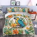 Tropical parrot duvet cover bedding set styled on a bedroom bed with colorful floral artwork