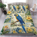Parrot duvet cover bedding set with blue tropical bird, hibiscus flowers, leafy panels, and bedroom presentation
