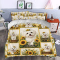 Maltese dog bedding set styled in a bedroom with sunflower accents and a bright farmhouse-inspired look