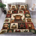 Highland cow duvet cover set displayed on a bed with festive Christmas patchwork artwork