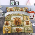 Highland cow duvet cover set styled in a bedroom with floral artwork, rustic panels, and matching pillowcases